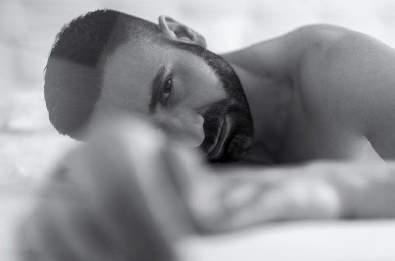 A non-explicit view of a male body, symbolizing male sexual response.